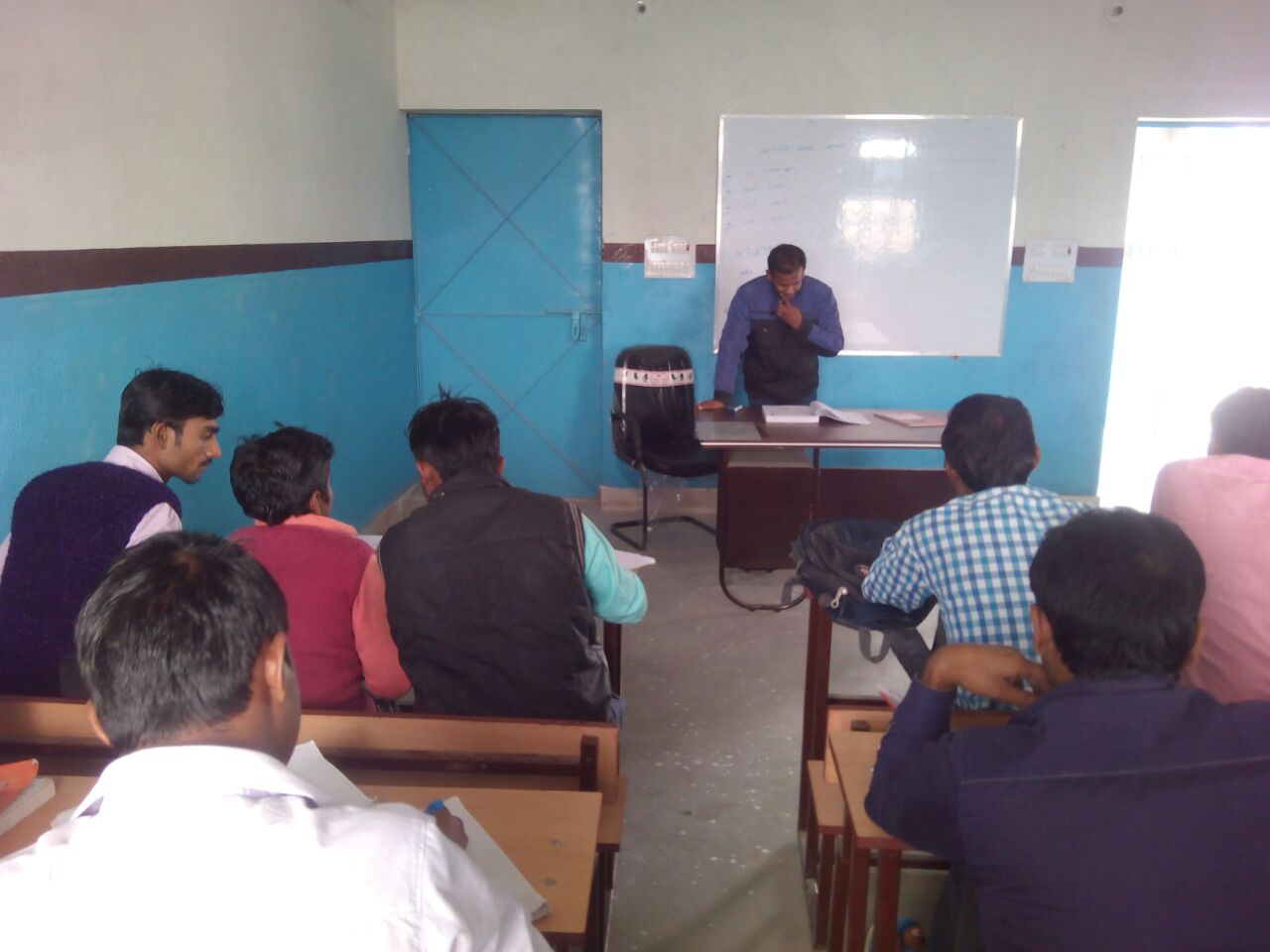 Instructor addressing students